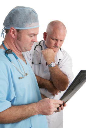 two doctors looking over xray - Prosthodontist in Port Orange